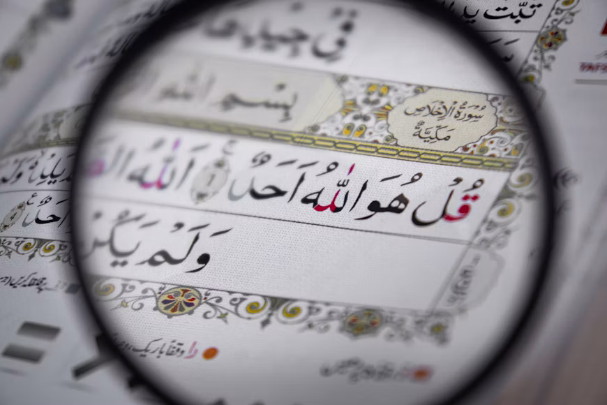 Quran open during a Tajweed lesson